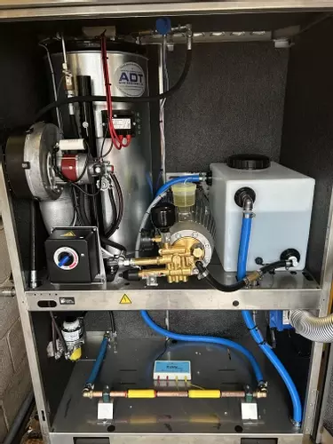 Internal view of the modified Nilfisk SH Truck static installation supplied for a fleet cleaning company in Tamworth. The machine was customised with multiple upgrades including low-level protection systems, modified water tank and float valve setup, wate